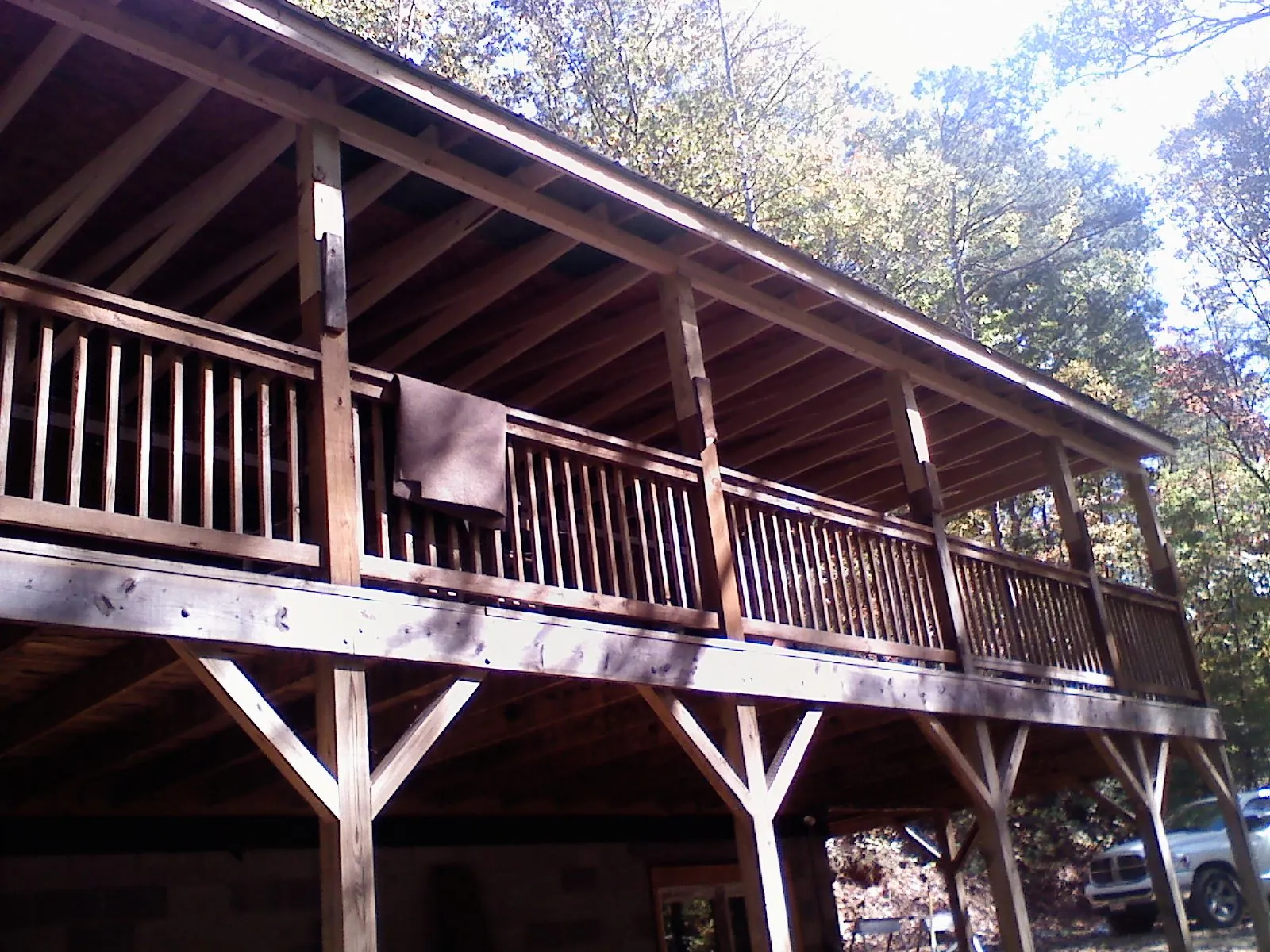 Timber framing under a new elevated porch and deck — Roof Leak Repair in Sunset by Roofing Brothers